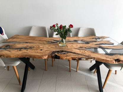 Live Edge olijf boomstam epoxy tafel x-frame poten zijkant