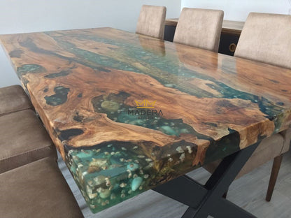 Rechte ocean epoxy eettafel met olijfhout en x-frame poten glanzend tafelblad